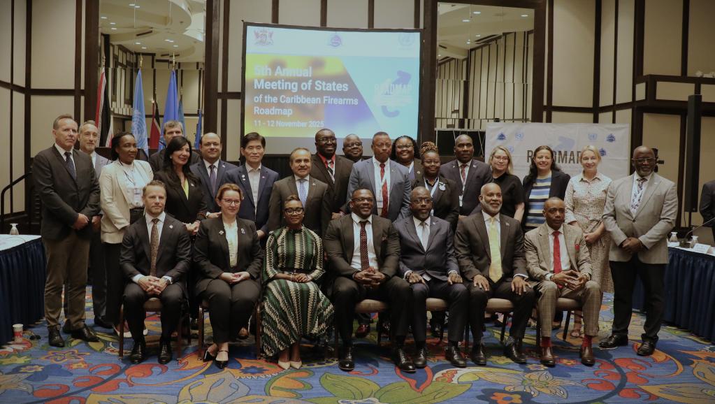 a group photo comprising the Minister of Homeland Security, UN officials, CARICOM IMPACS officials, Caribbean representatives and ambassadors 